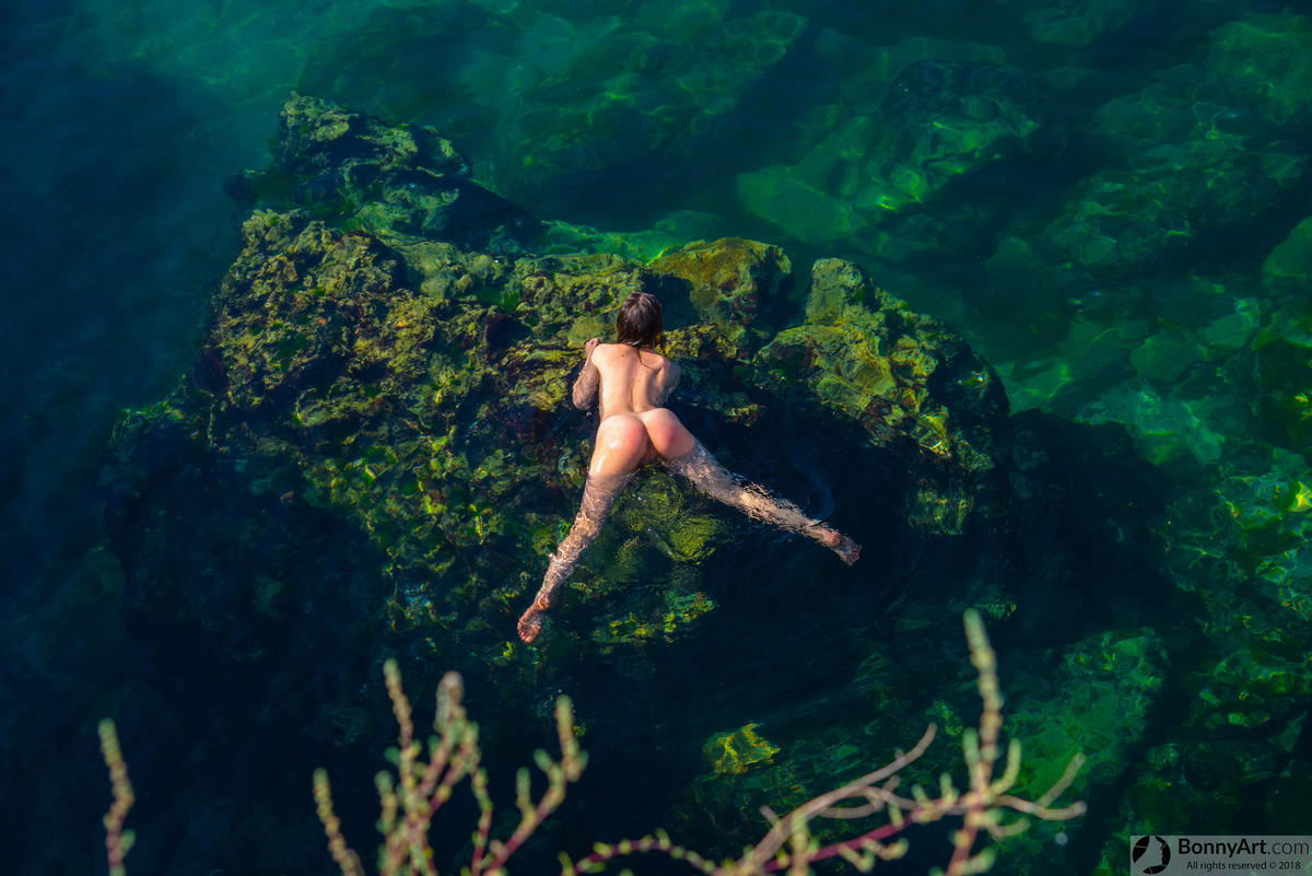 Nudist Young Girl Floating Butt Swimming